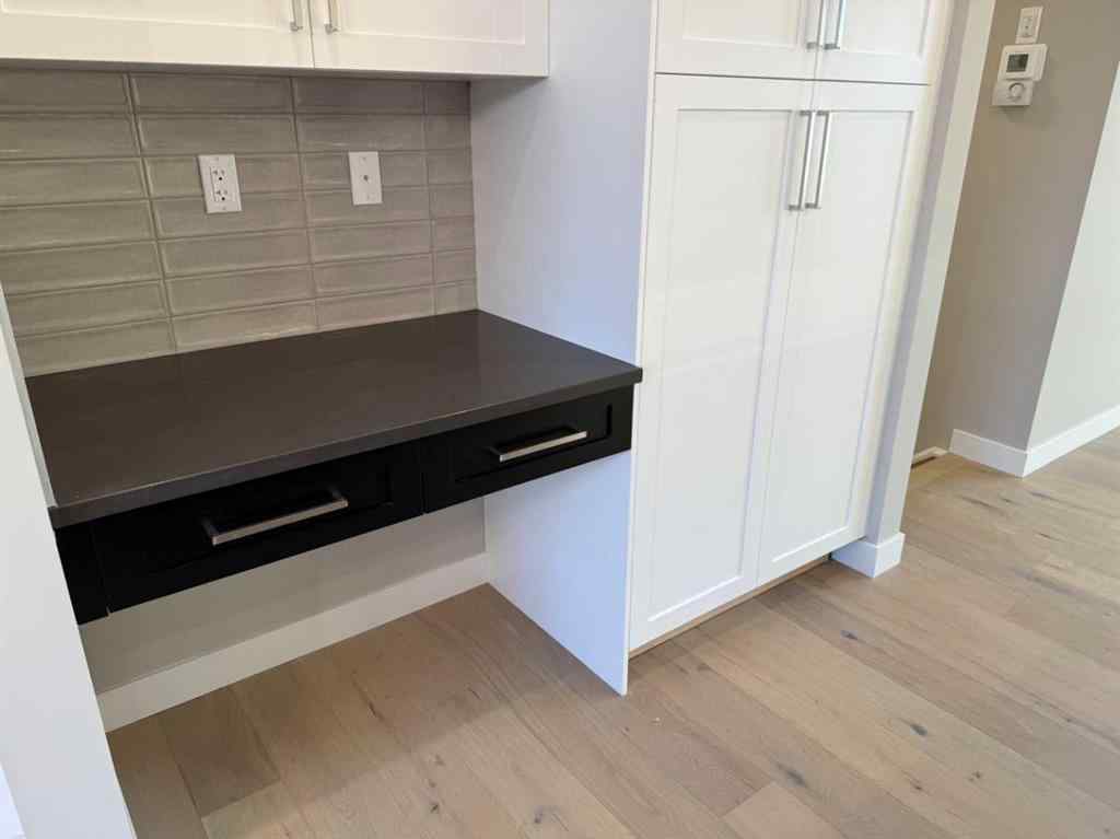 MLS® A2256036 - 302 Sundown Road  in Sunset Ridge Cochrane, Residential