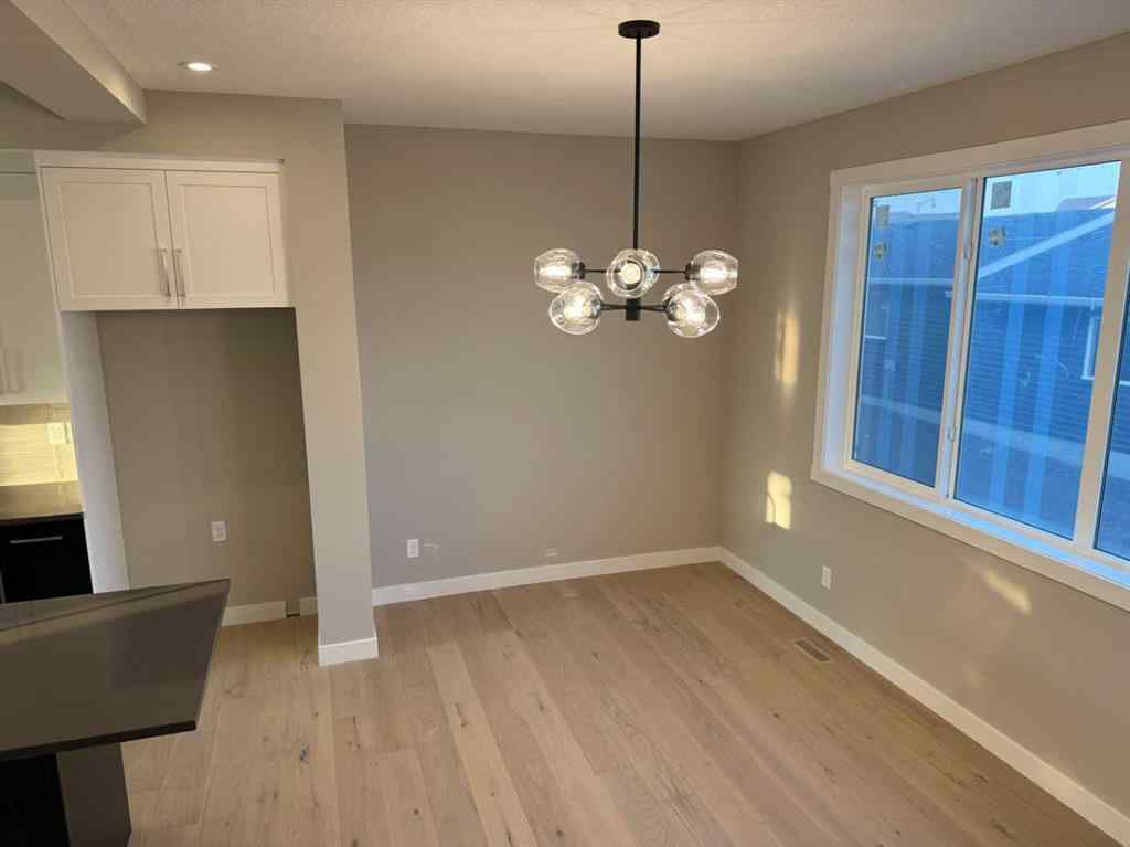 MLS® A2256036 - 302 Sundown Road  in Sunset Ridge Cochrane, Residential