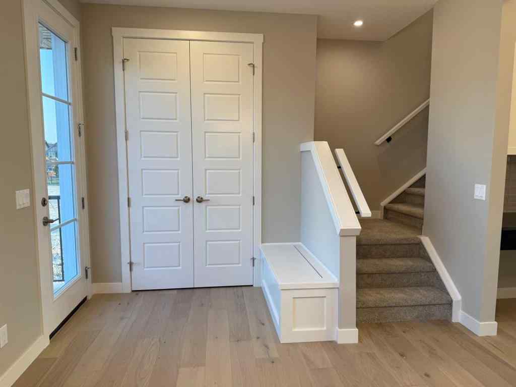 MLS® A2256036 - 302 Sundown Road  in Sunset Ridge Cochrane, Residential