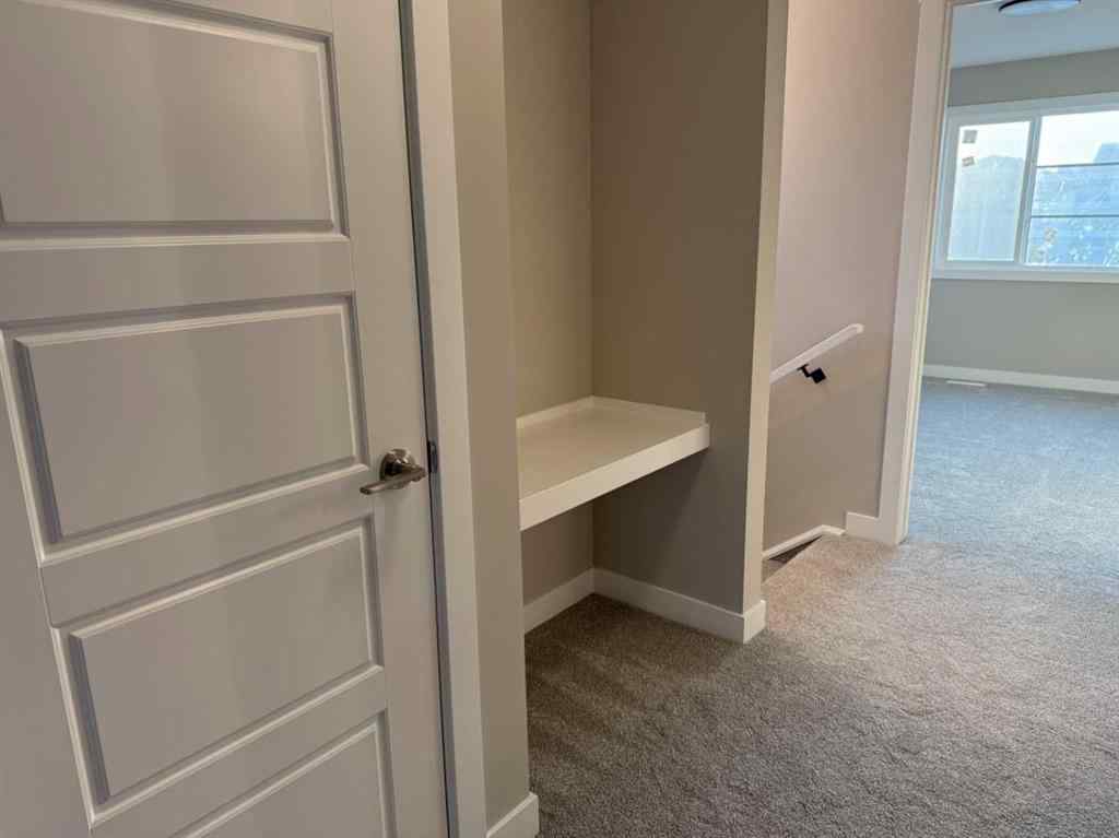 MLS® A2256036 - 302 Sundown Road  in Sunset Ridge Cochrane, Residential
