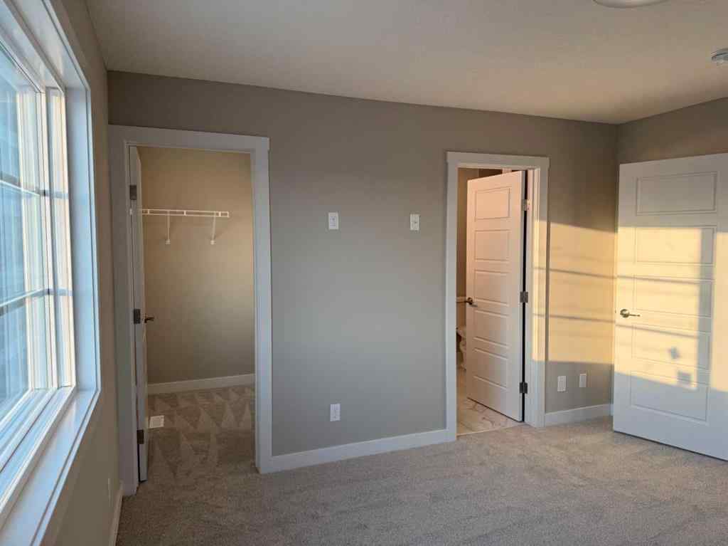 MLS® A2256036 - 302 Sundown Road  in Sunset Ridge Cochrane, Residential