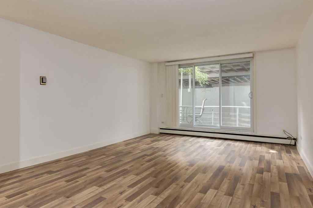 MLS® A2256040 - Unit #203 1027 Cameron Avenue SW in Lower Mount Royal Calgary, Residential