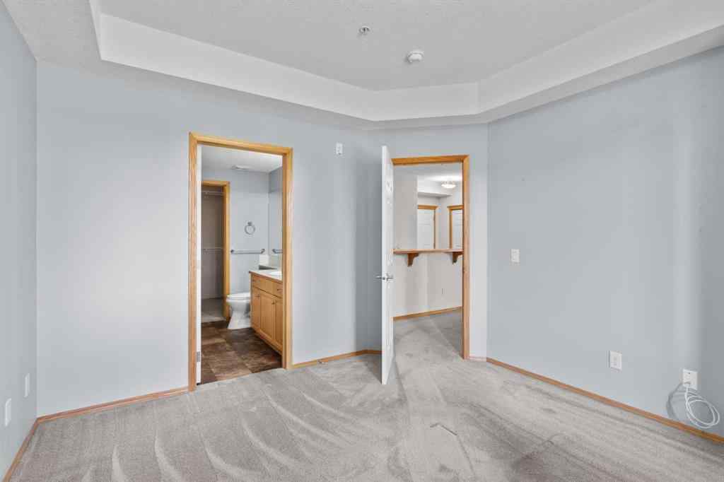 MLS® A2256041 - Unit #239 15 Everstone Drive SW in Evergreen Calgary, Residential