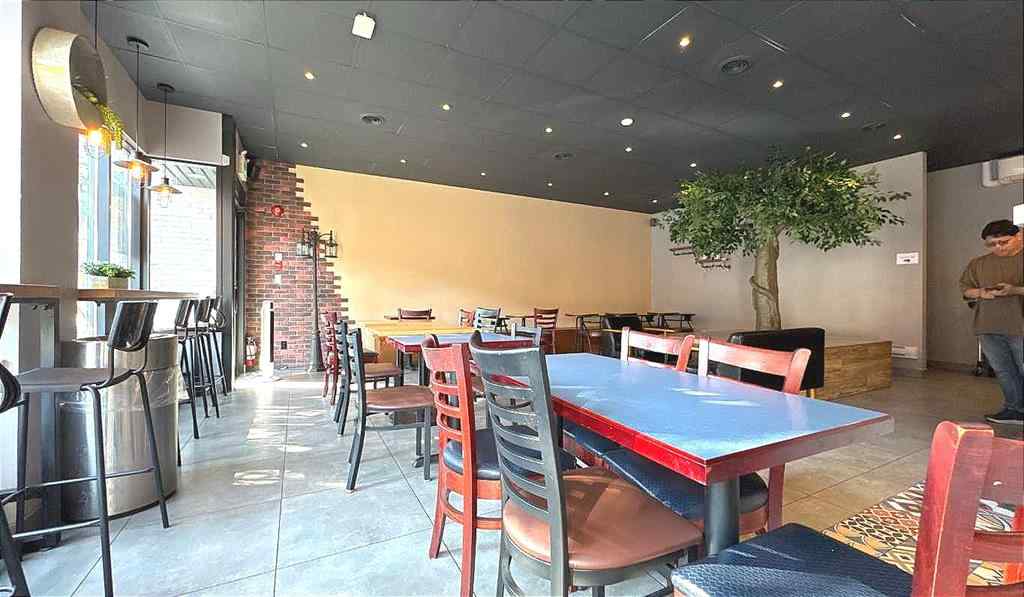 MLS® A2256066 - Unit #103 233 Centre Street SW in Downtown Commercial Core Calgary, Commercial