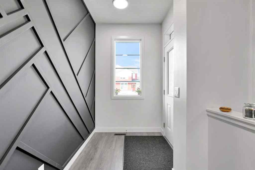 MLS® A2256104 - 117 Ambleton Drive NW in Moraine Calgary, Residential