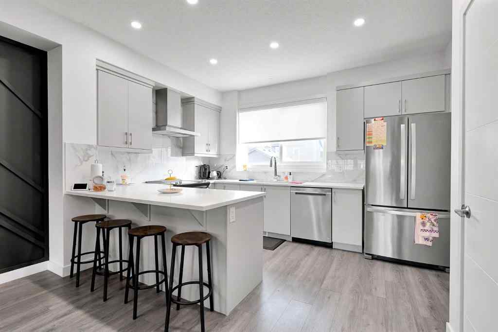 MLS® A2256104 - 117 Ambleton Drive NW in Moraine Calgary, Residential