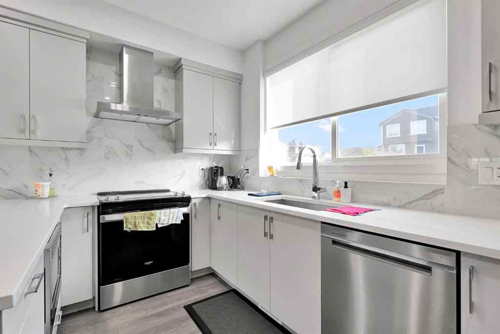 MLS® A2256104 - 117 Ambleton Drive NW in Moraine Calgary, Residential