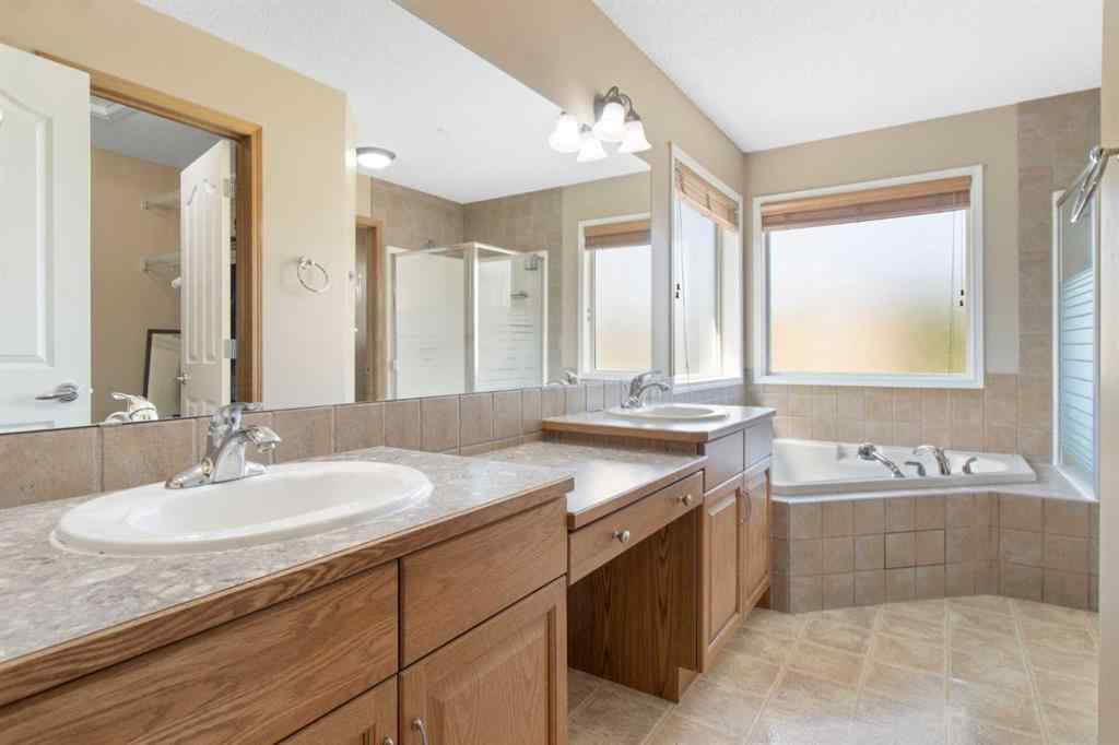 MLS® A2256106 - 235 Everwillow Close SW in Evergreen Calgary, Residential