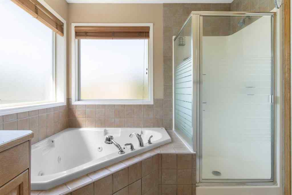 MLS® A2256106 - 235 Everwillow Close SW in Evergreen Calgary, Residential