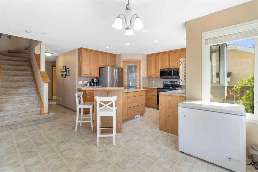 MLS® A2256106 - 235 Everwillow Close SW in Evergreen Calgary, Residential