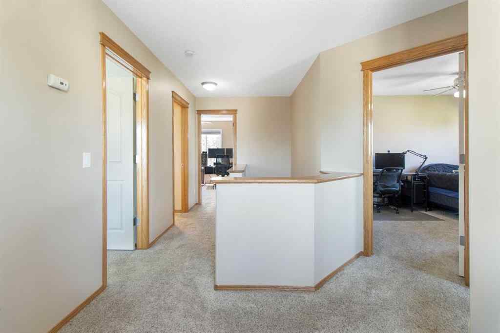 MLS® A2256106 - 235 Everwillow Close SW in Evergreen Calgary, Residential
