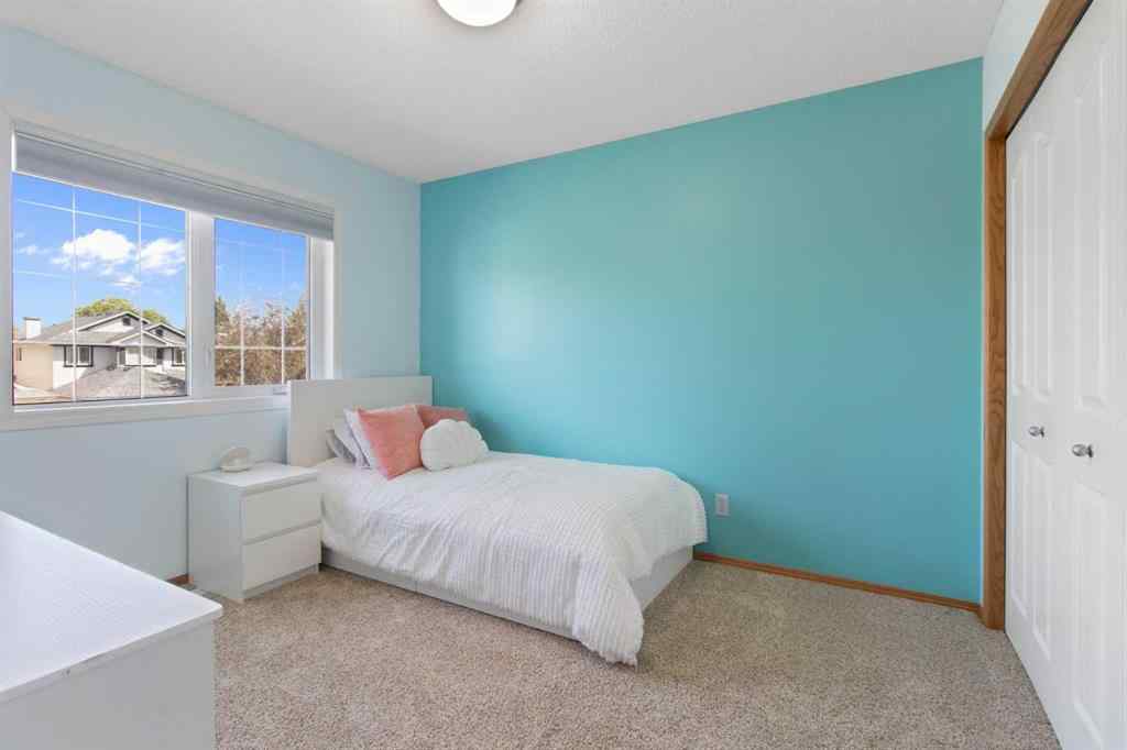 MLS® A2256106 - 235 Everwillow Close SW in Evergreen Calgary, Residential