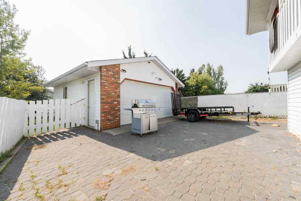 MLS® A2256108 - 9037 103 Avenue  in Ivy Lake Estates Grande Prairie, Residential