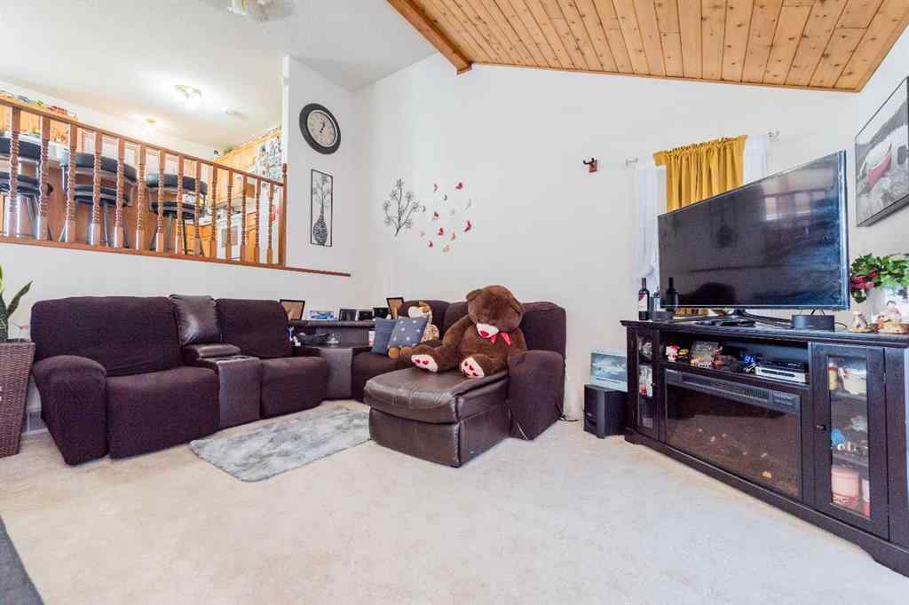 MLS® A2256108 - 9037 103 Avenue  in Ivy Lake Estates Grande Prairie, Residential