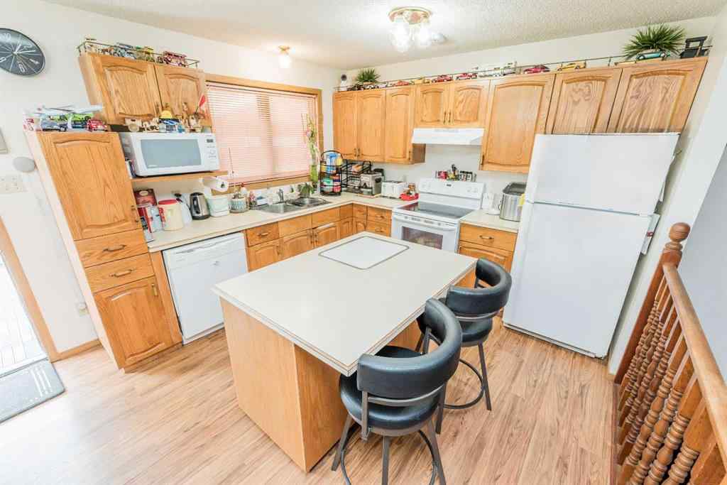 MLS® A2256108 - 9037 103 Avenue  in Ivy Lake Estates Grande Prairie, Residential
