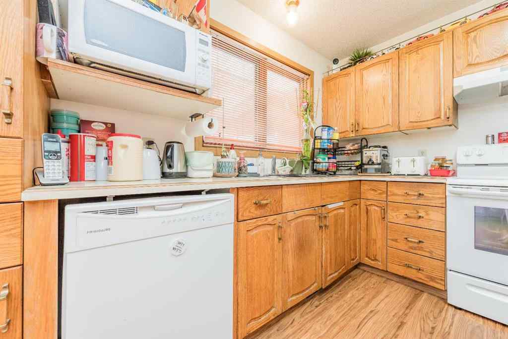 MLS® A2256108 - 9037 103 Avenue  in Ivy Lake Estates Grande Prairie, Residential