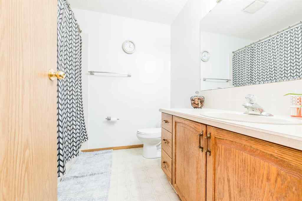 MLS® A2256108 - 9037 103 Avenue  in Ivy Lake Estates Grande Prairie, Residential