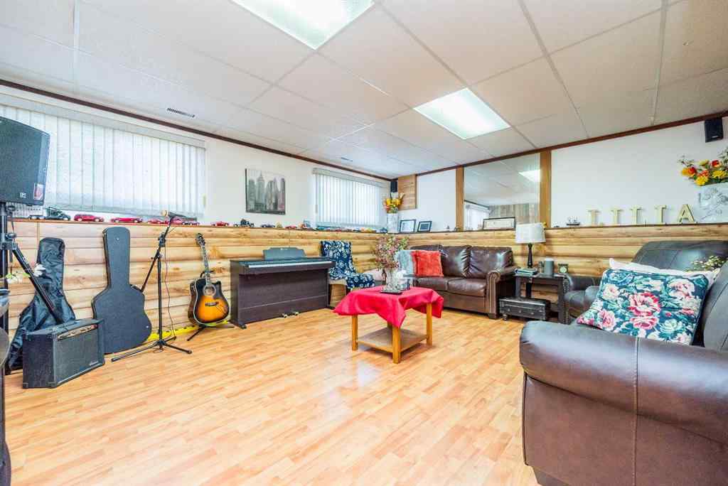 MLS® A2256108 - 9037 103 Avenue  in Ivy Lake Estates Grande Prairie, Residential