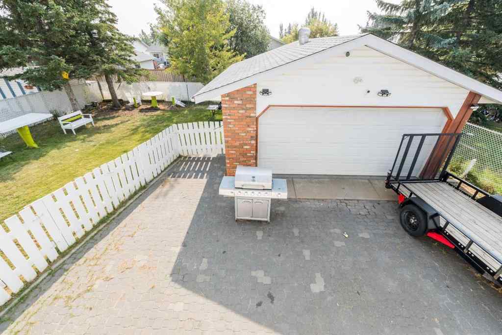 MLS® A2256108 - 9037 103 Avenue  in Ivy Lake Estates Grande Prairie, Residential