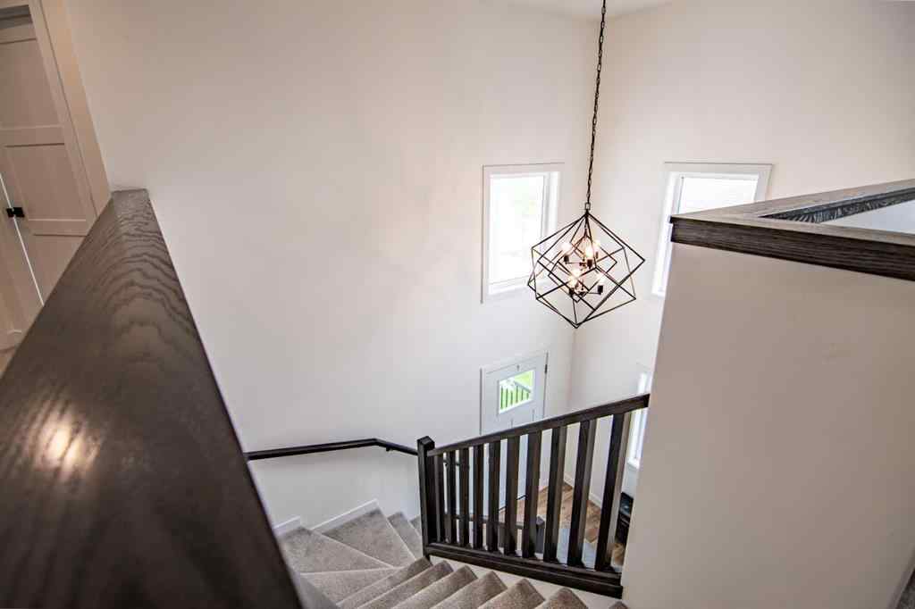 MLS® A2256122 - 587 Robinson Avenue  in Palisades Penhold, Residential
