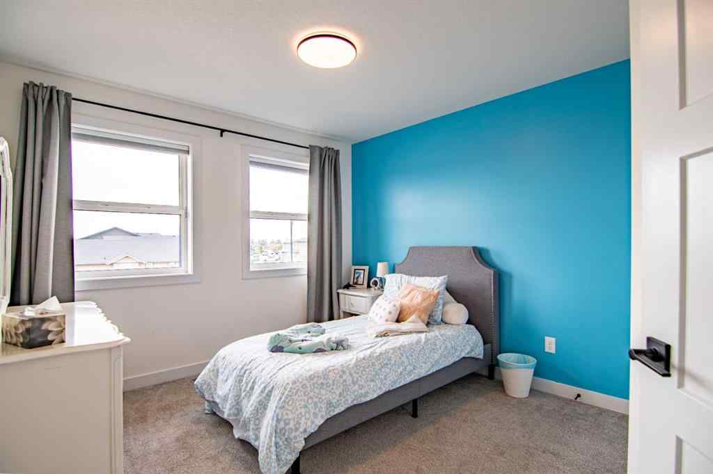 MLS® A2256122 - 587 Robinson Avenue  in Palisades Penhold, Residential