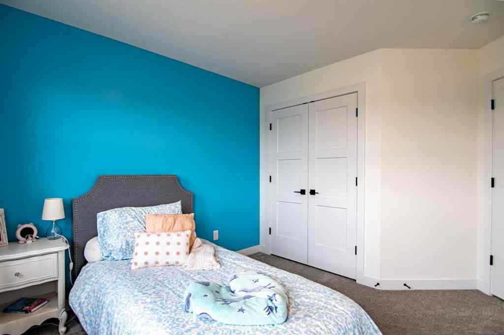 MLS® A2256122 - 587 Robinson Avenue  in Palisades Penhold, Residential