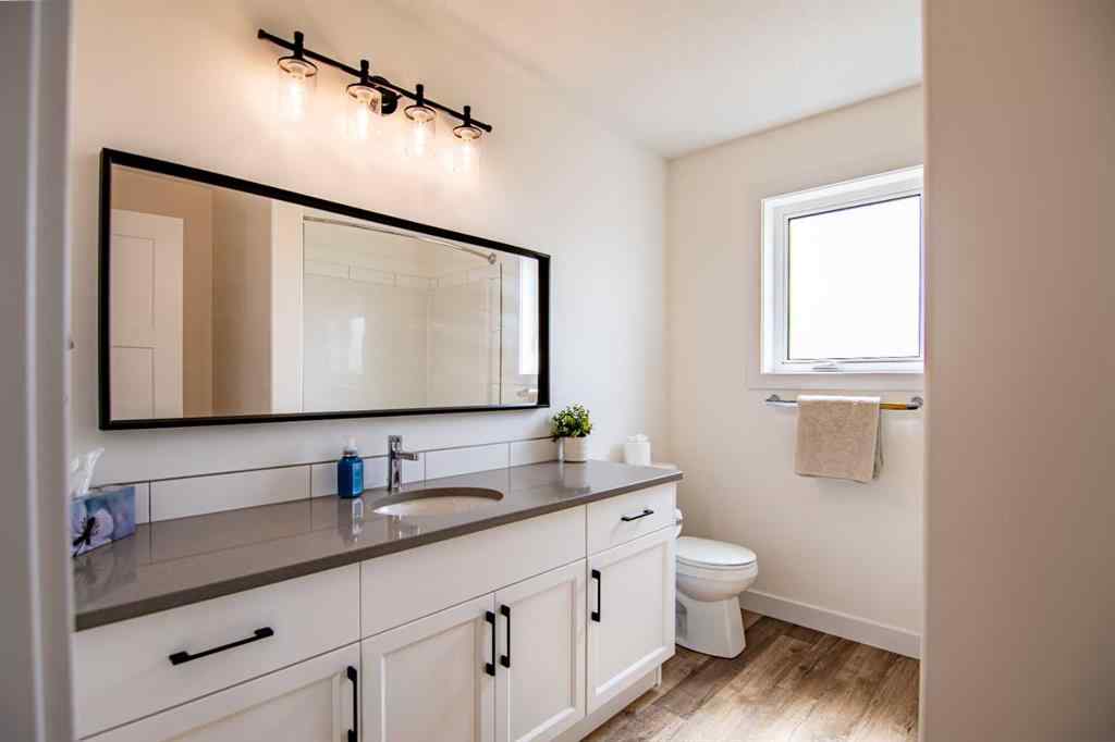 MLS® A2256122 - 587 Robinson Avenue  in Palisades Penhold, Residential