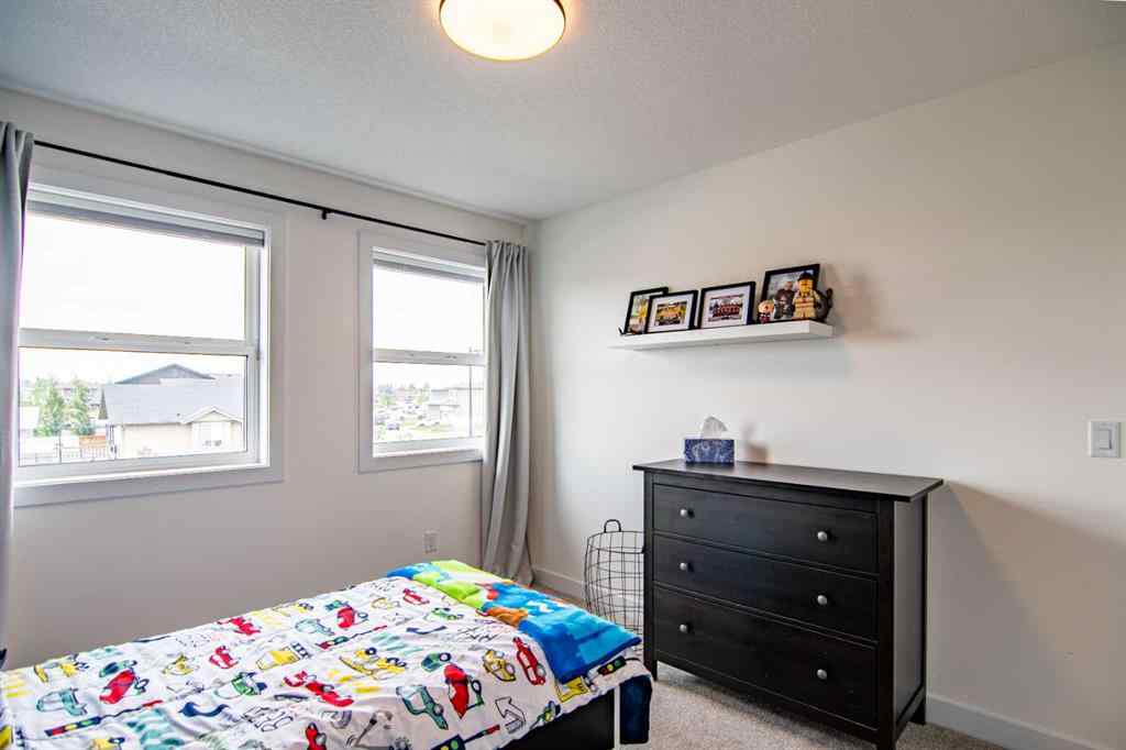 MLS® A2256122 - 587 Robinson Avenue  in Palisades Penhold, Residential