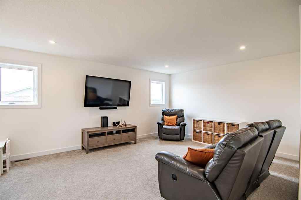 MLS® A2256122 - 587 Robinson Avenue  in Palisades Penhold, Residential