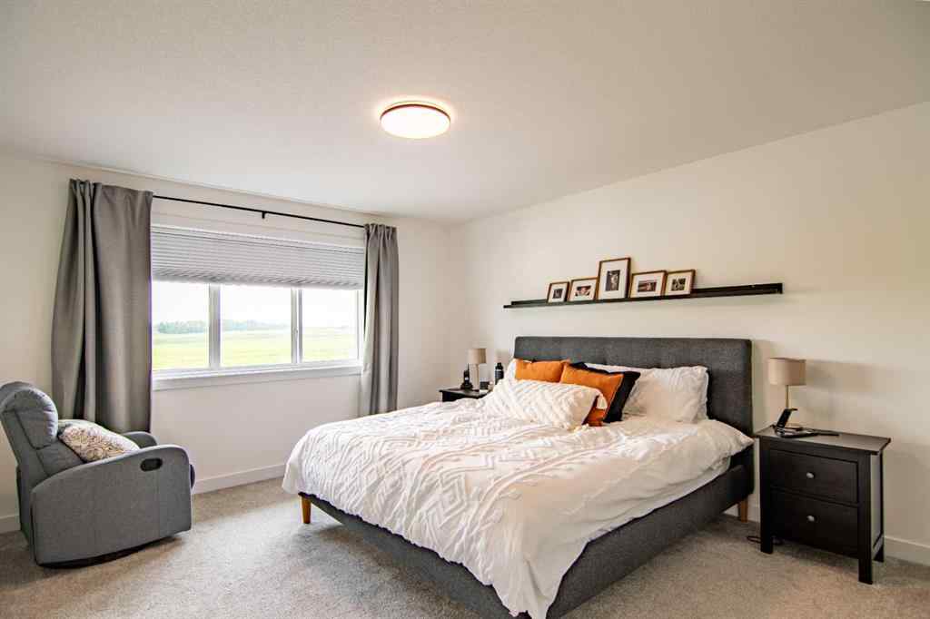 MLS® A2256122 - 587 Robinson Avenue  in Palisades Penhold, Residential