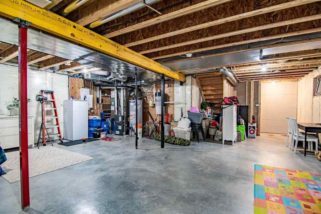 MLS® A2256122 - 587 Robinson Avenue  in Palisades Penhold, Residential