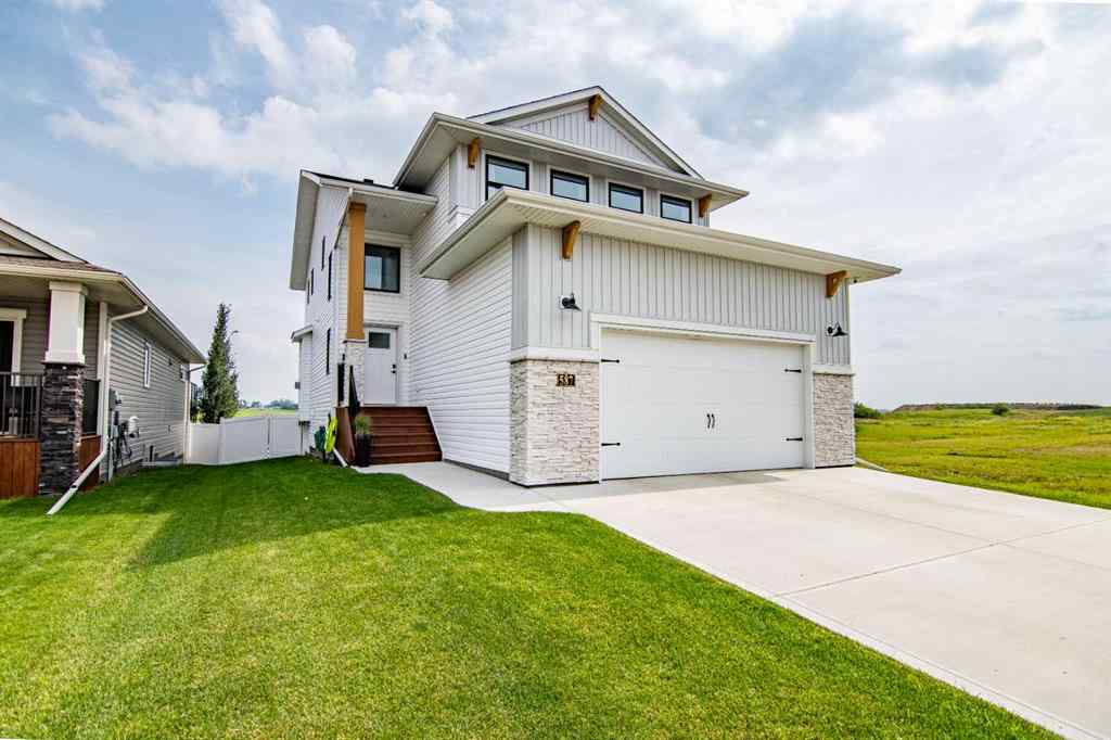 MLS® A2256122 - 587 Robinson Avenue  in Palisades Penhold, Residential