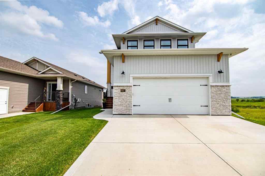 MLS® A2256122 - 587 Robinson Avenue  in Palisades Penhold, Residential