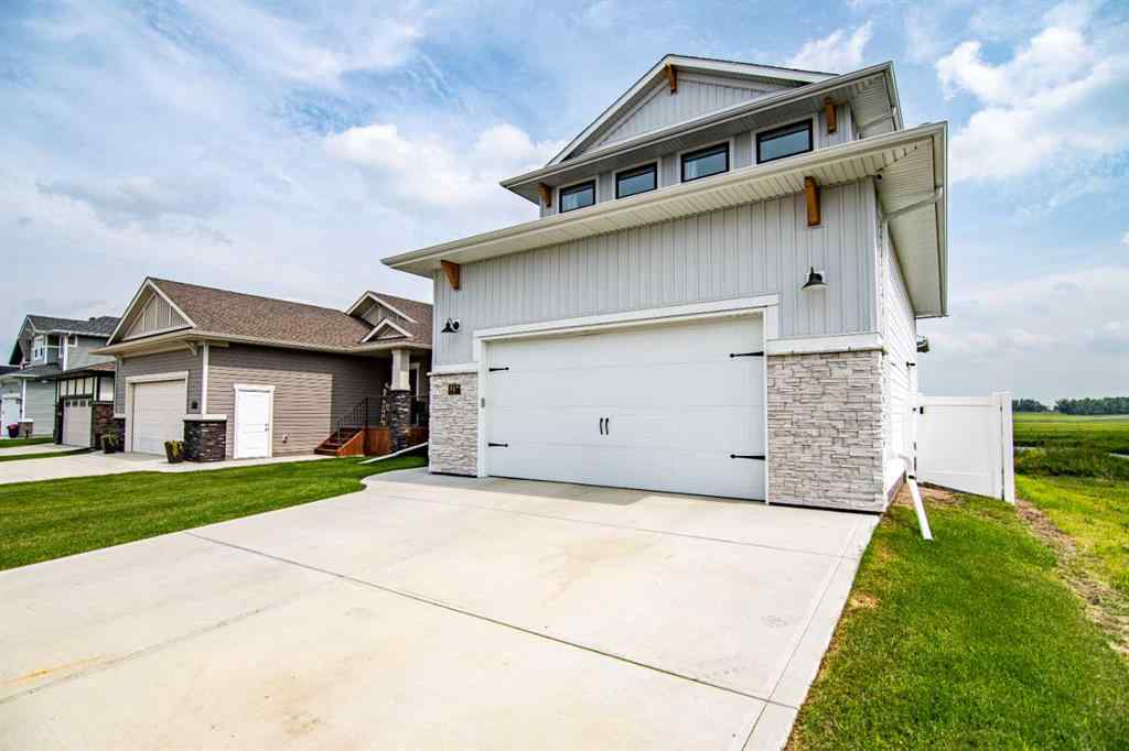 MLS® A2256122 - 587 Robinson Avenue  in Palisades Penhold, Residential