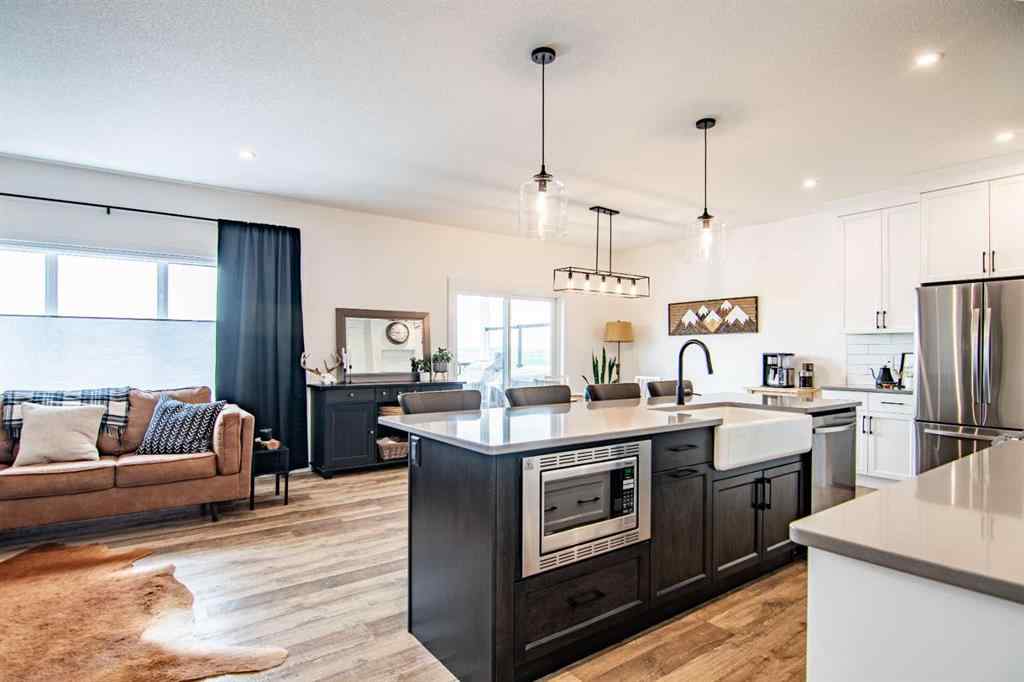 MLS® A2256122 - 587 Robinson Avenue  in Palisades Penhold, Residential