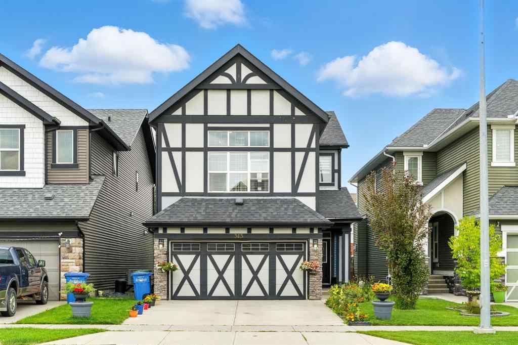 MLS® A2256123 - 313 Kings Heights Drive SE in Kings Heights Airdrie, Residential
