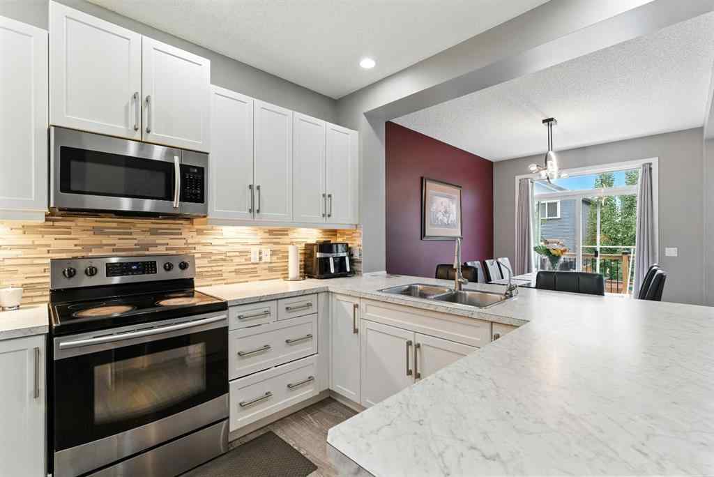 MLS® A2256123 - 313 Kings Heights Drive SE in Kings Heights Airdrie, Residential