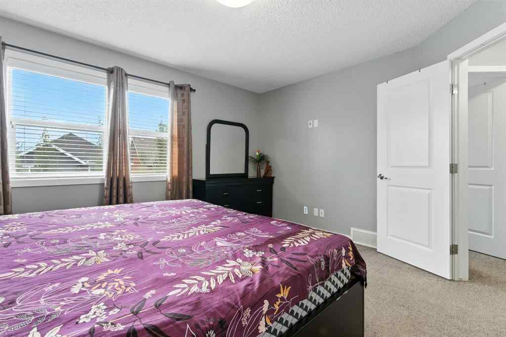 MLS® A2256123 - 313 Kings Heights Drive SE in Kings Heights Airdrie, Residential