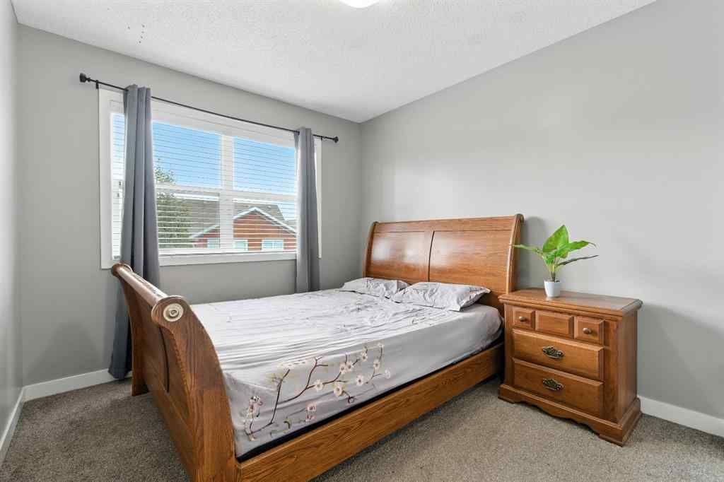 MLS® A2256123 - 313 Kings Heights Drive SE in Kings Heights Airdrie, Residential