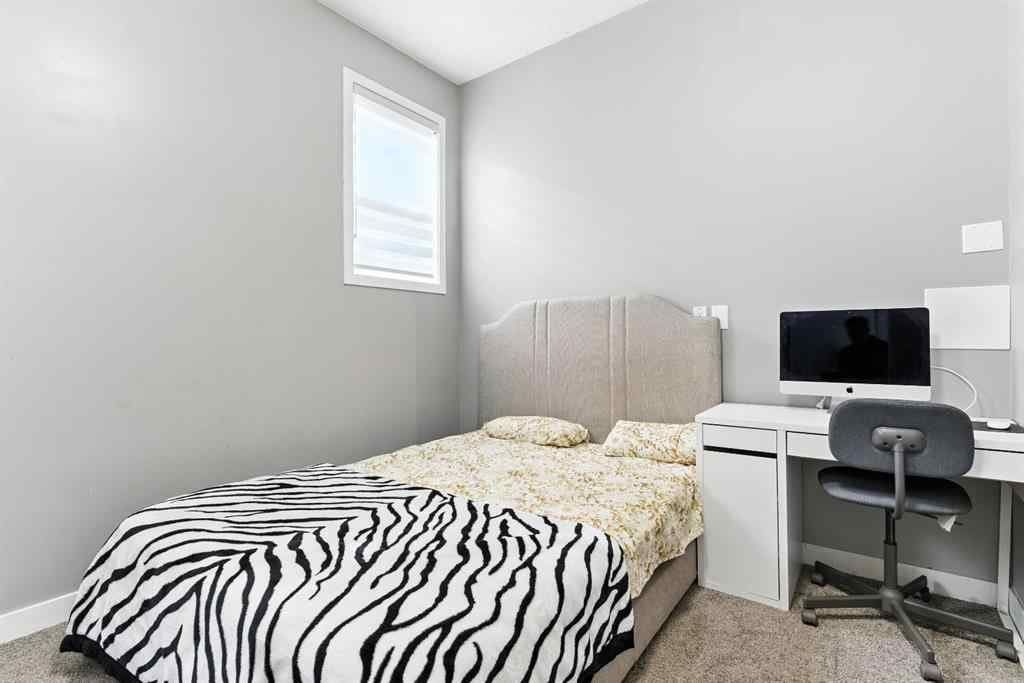 MLS® A2256123 - 313 Kings Heights Drive SE in Kings Heights Airdrie, Residential