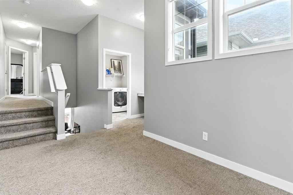MLS® A2256123 - 313 Kings Heights Drive SE in Kings Heights Airdrie, Residential