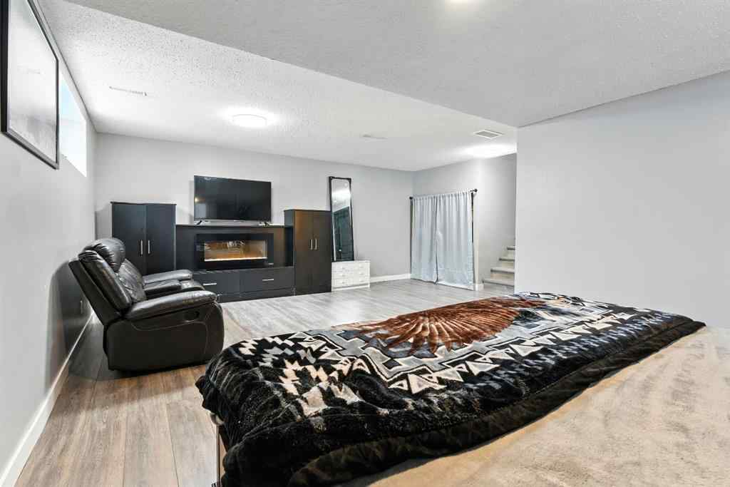 MLS® A2256123 - 313 Kings Heights Drive SE in Kings Heights Airdrie, Residential