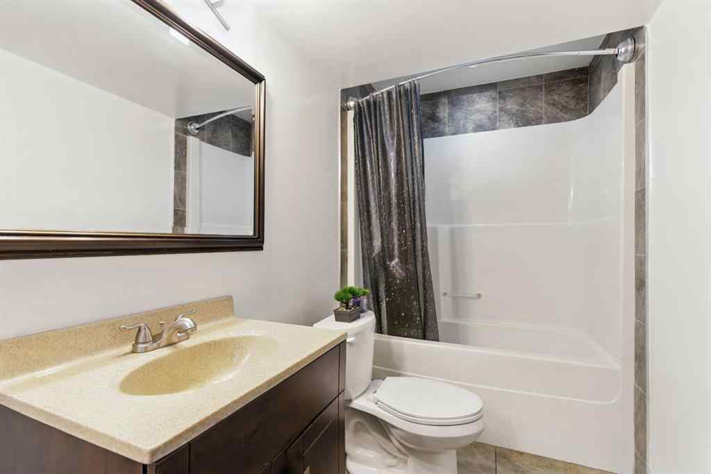 MLS® A2256123 - 313 Kings Heights Drive SE in Kings Heights Airdrie, Residential