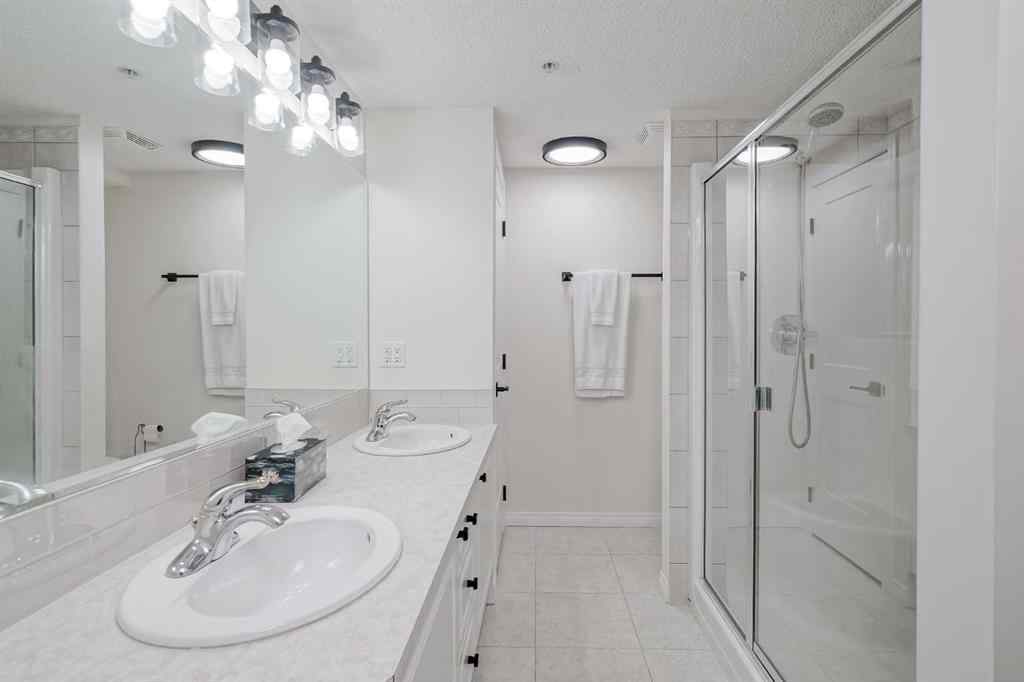 MLS® A2256132 - Unit #201 40 Parkridge View SE in Parkland Calgary, Residential