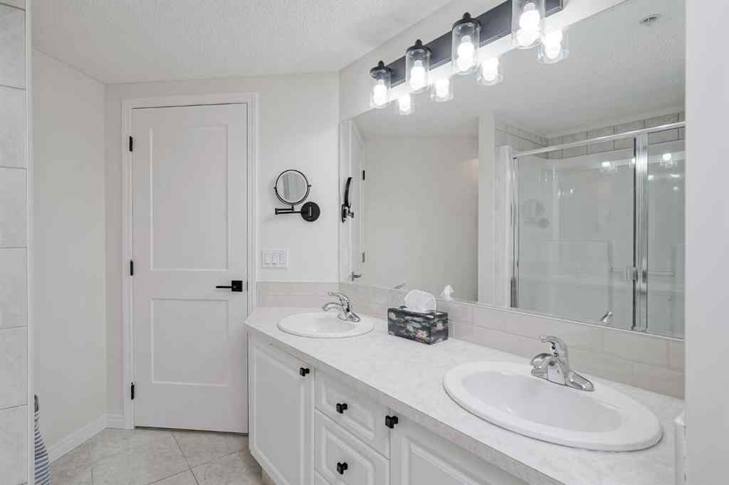 MLS® A2256132 - Unit #201 40 Parkridge View SE in Parkland Calgary, Residential