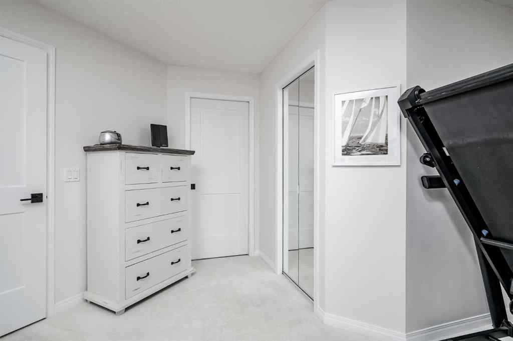 MLS® A2256132 - Unit #201 40 Parkridge View SE in Parkland Calgary, Residential