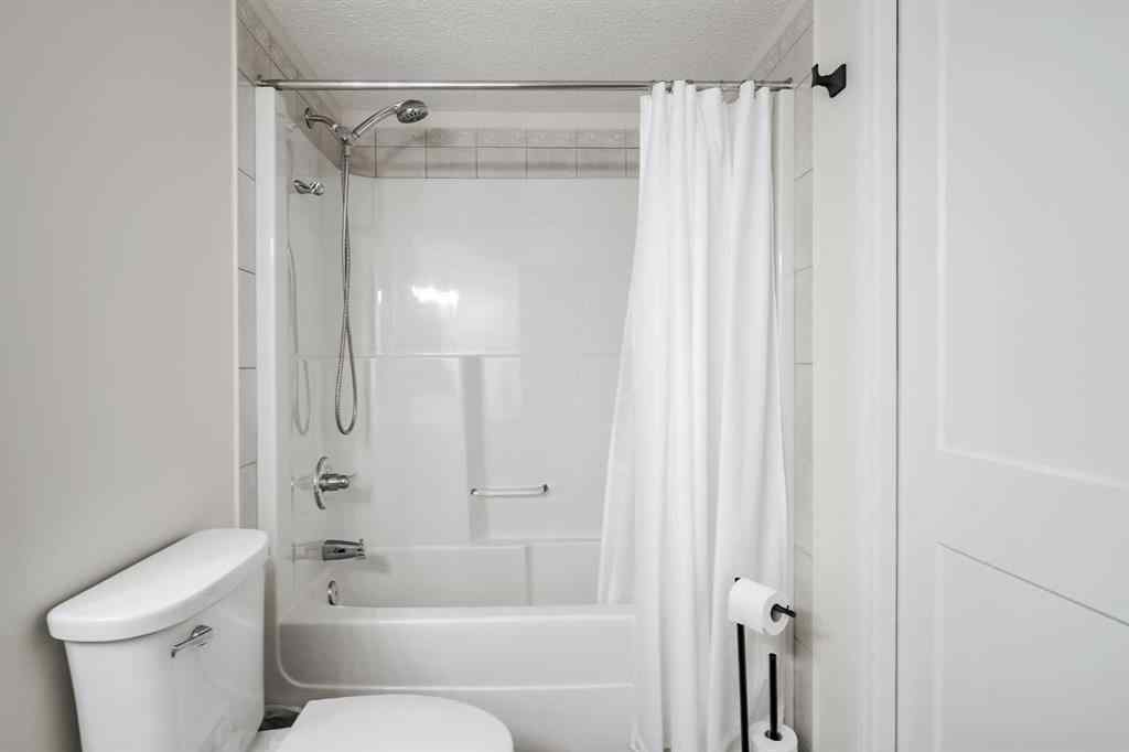MLS® A2256132 - Unit #201 40 Parkridge View SE in Parkland Calgary, Residential