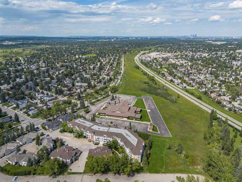 MLS® A2256132 - Unit #201 40 Parkridge View SE in Parkland Calgary, Residential