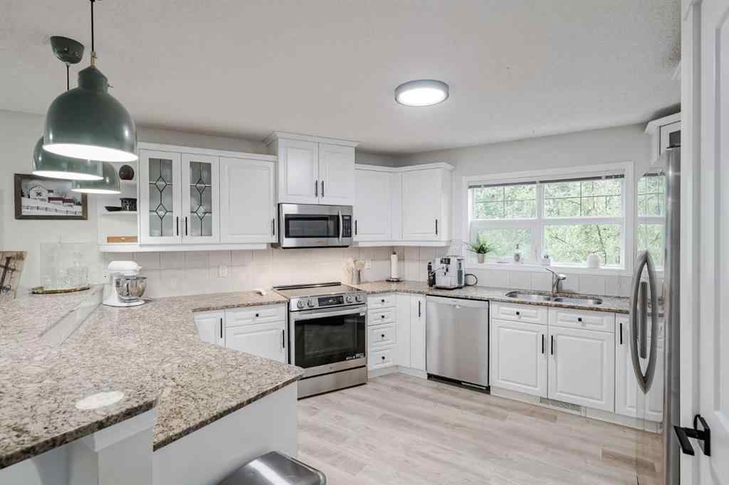 MLS® A2256132 - Unit #201 40 Parkridge View SE in Parkland Calgary, Residential