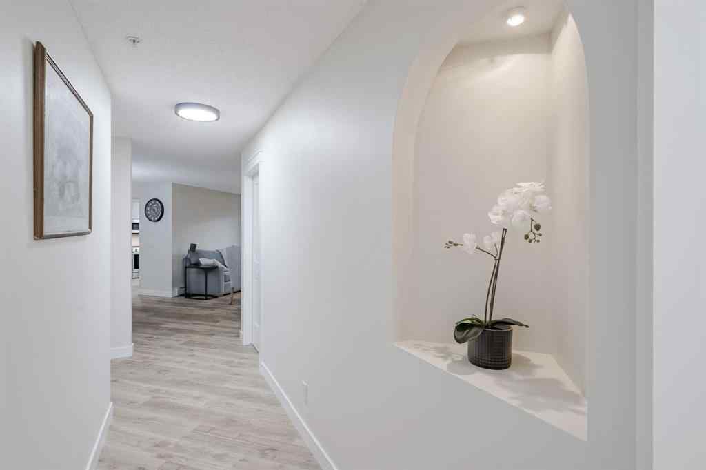 MLS® A2256132 - Unit #201 40 Parkridge View SE in Parkland Calgary, Residential